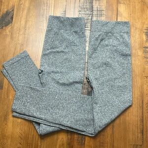 Two pairs of marbled leggings.